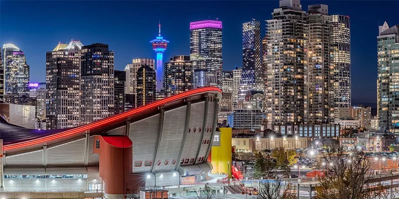 Calgary skyline and the Saddledome at dusk