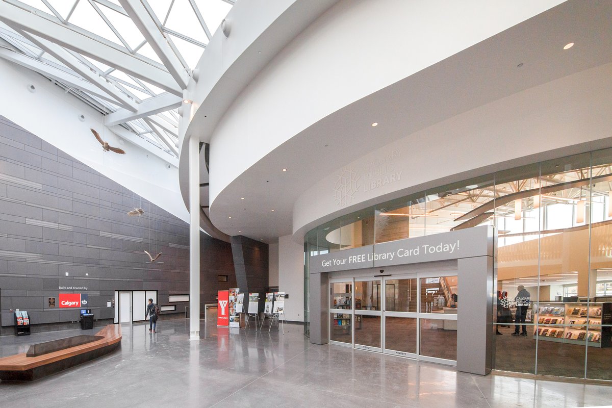 The glass entrance to Seton Library inside the YMCA building.